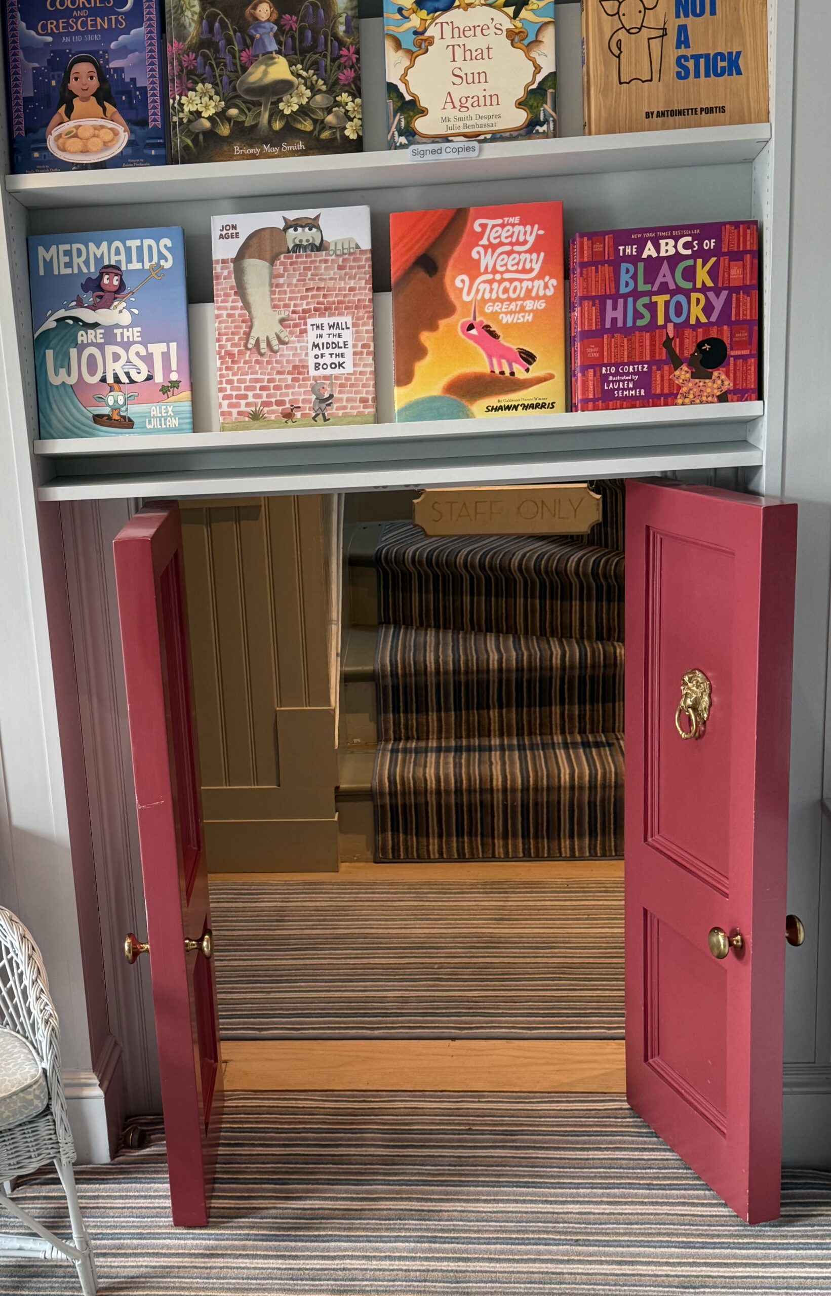 Tiny child-sized doorway on the Children's floor at Beacon Hill Books & Cafe